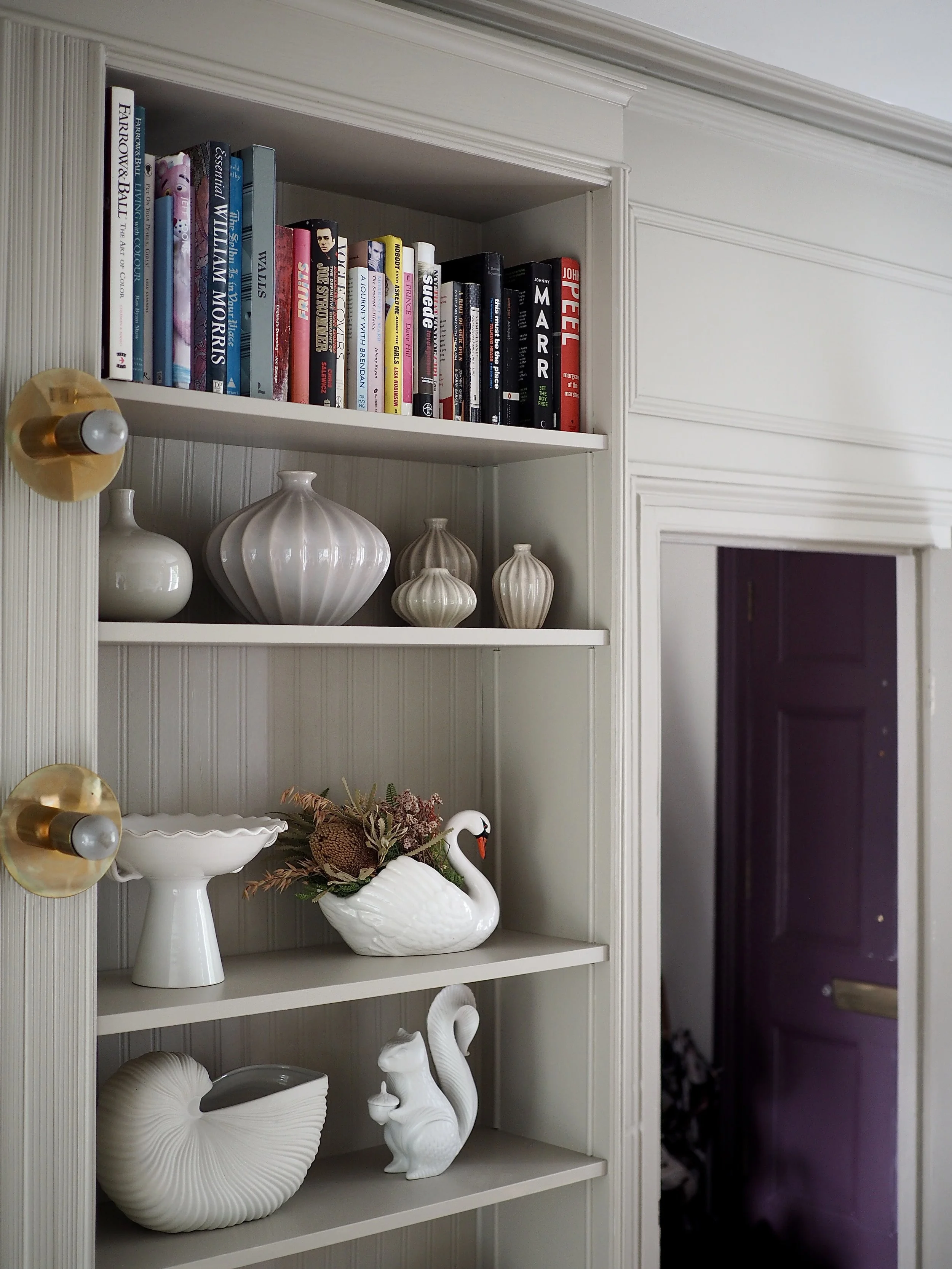 beadboard wallpaper in a bookcase