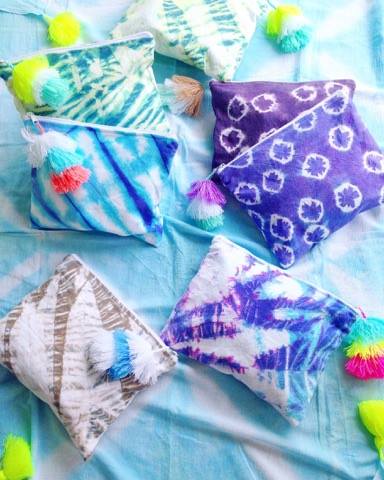 These beautiful clutches are hand died by Emilia and the interior material is plastic, which is super handy for shoving your wet bikinis!