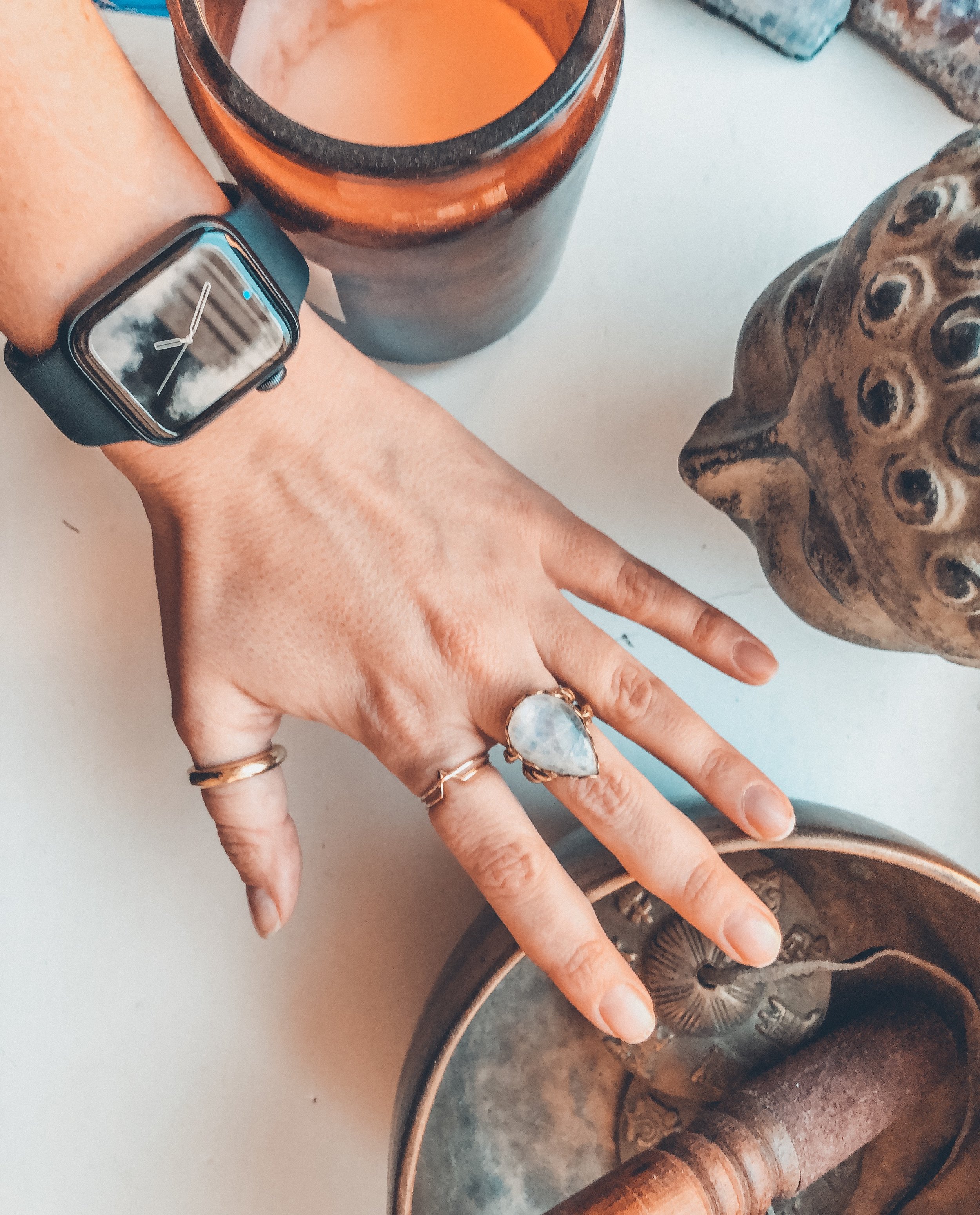 An Apple Watch, Buddha, Zafiro jewelry, singing bowls and candles. What else do you need?