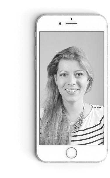 white iphone with black & white image of blonde woman smiling on screen