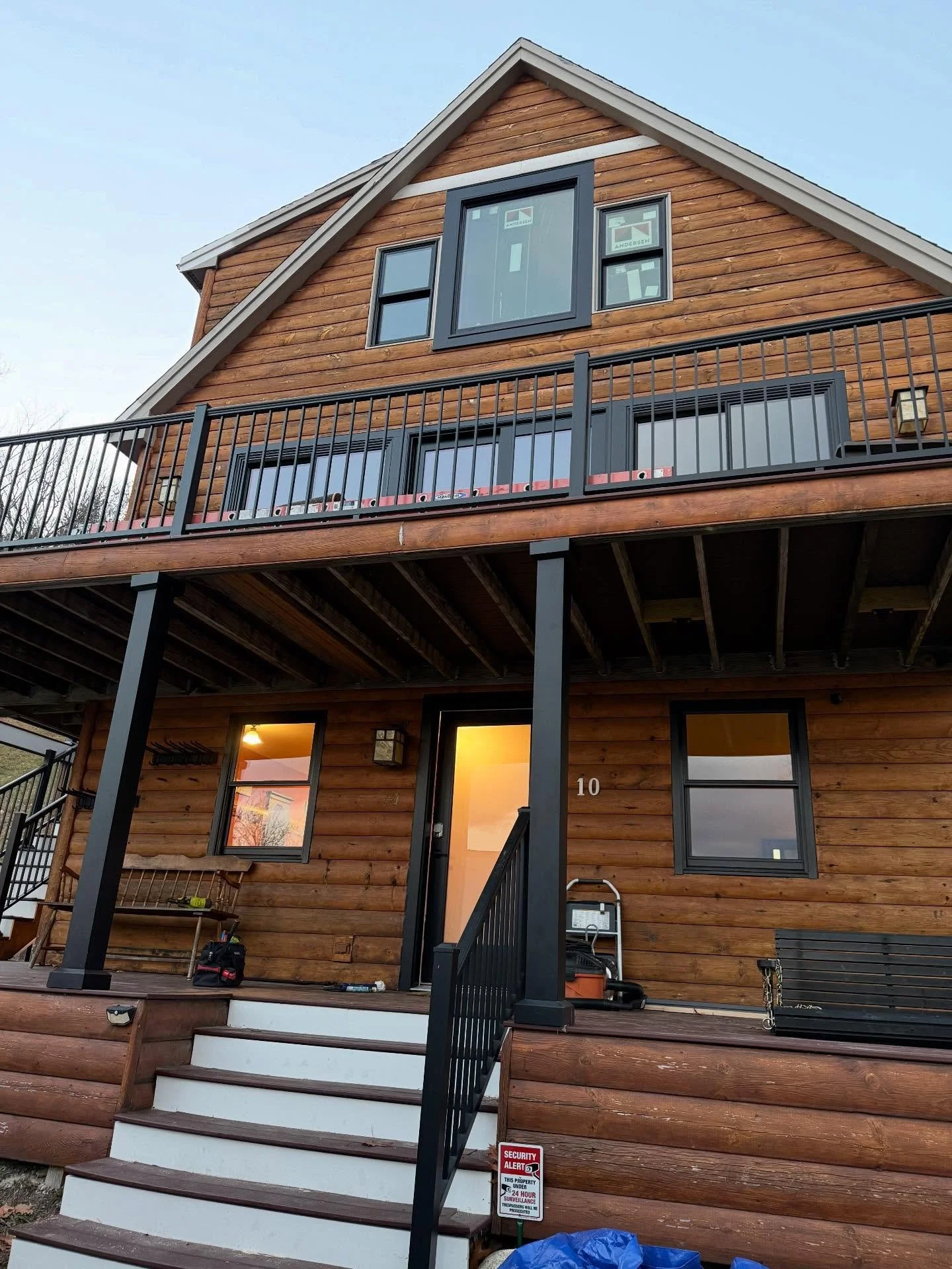 Beautiful, black trim Andersen windows &amp; doors installed in Bridgton, Maine. Swipe to see what an impact black windows and exterior trim can make!