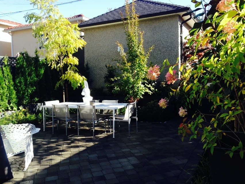  Planting - A formal framework with beds featuring a pallet of perennials and shrubs chosen for contrast in leaf and flower shape, texture and colour. 