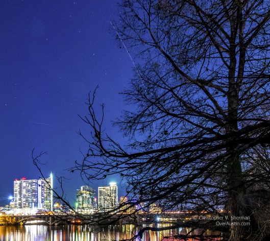 Photograph taken by Christopher Sherman over Austin that shows an object streaking through the sky. This was taken at roughly the same time as Jensen's sighting.