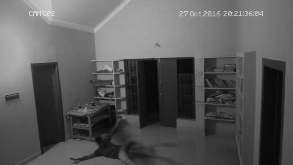 A still from the video that shows the teen flailing around after the attack.