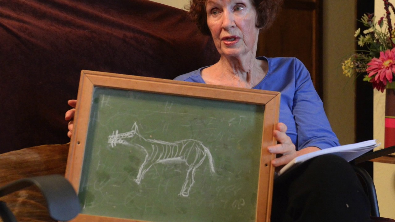 M.J. Blunt, along with a drawing of a creature she says she saw a few months ago in the Box Springs Mountain area.