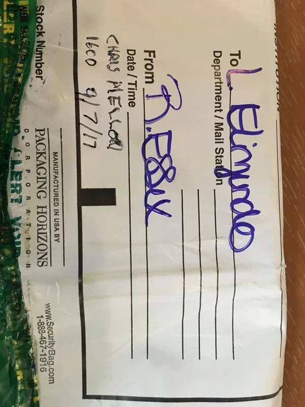 A shipping label that appears to be addressed to Elizondo.