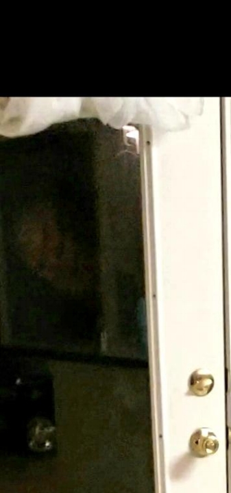 An enlarged still image of the face.