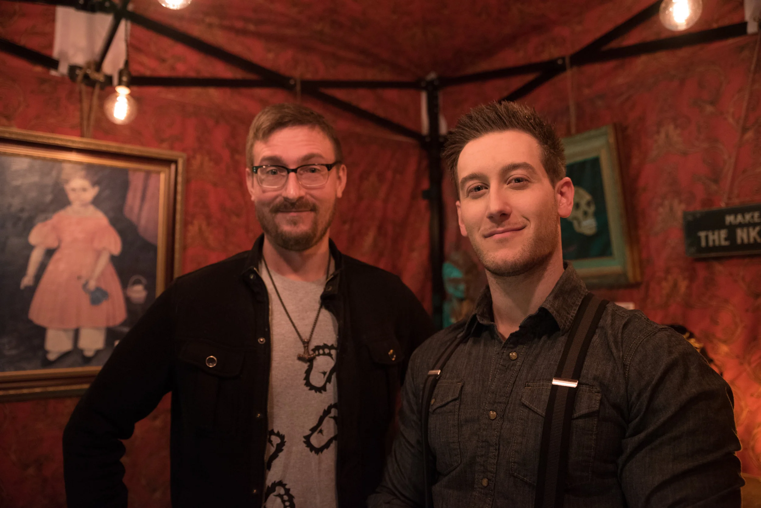 Artist Tyler Strand standing with our own Tobias Wayland. Tyler has put his artistic talents to good use in the museum.