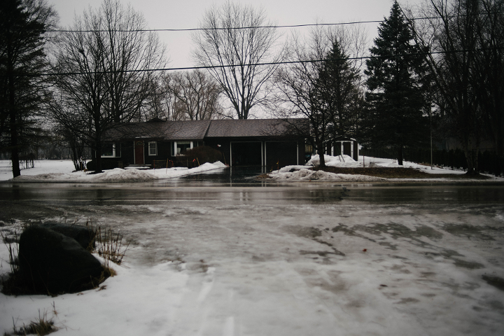 Directly across the street from the entrance. The witness lost sight of the creature almost immediately after it left the illumination of his car’s headlights, but it may have crossed along the treeline to the reader’s right of this house and into the McHenry County Fairgrounds—which leads into fields and more natural areas. (Emily Wayland / Singular Fortean Society)