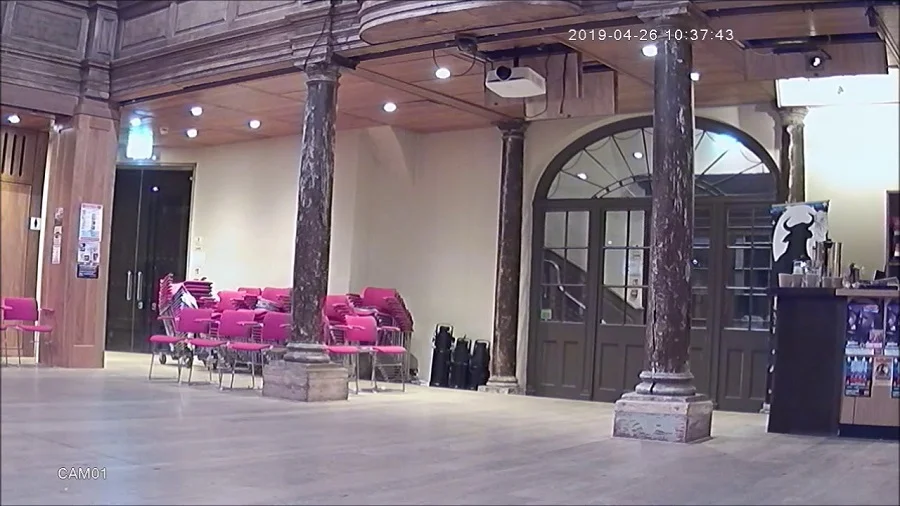 The shadows can be seen flitting from left to right through the windows inset in the doors. (Ghosted UK)