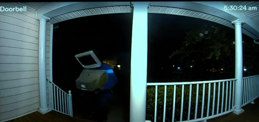 Security camera footage of the mysterious delivery person. (WSLS 10)