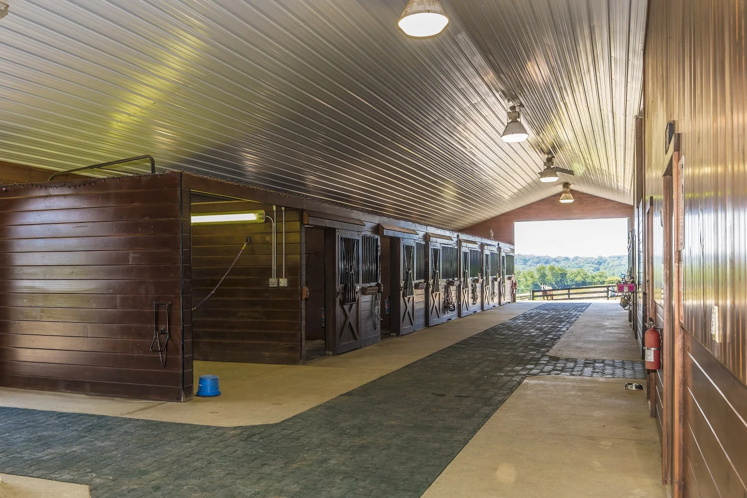 Our extra wide barn AISLE makes MANEUVERING with multiple horses safe and easy