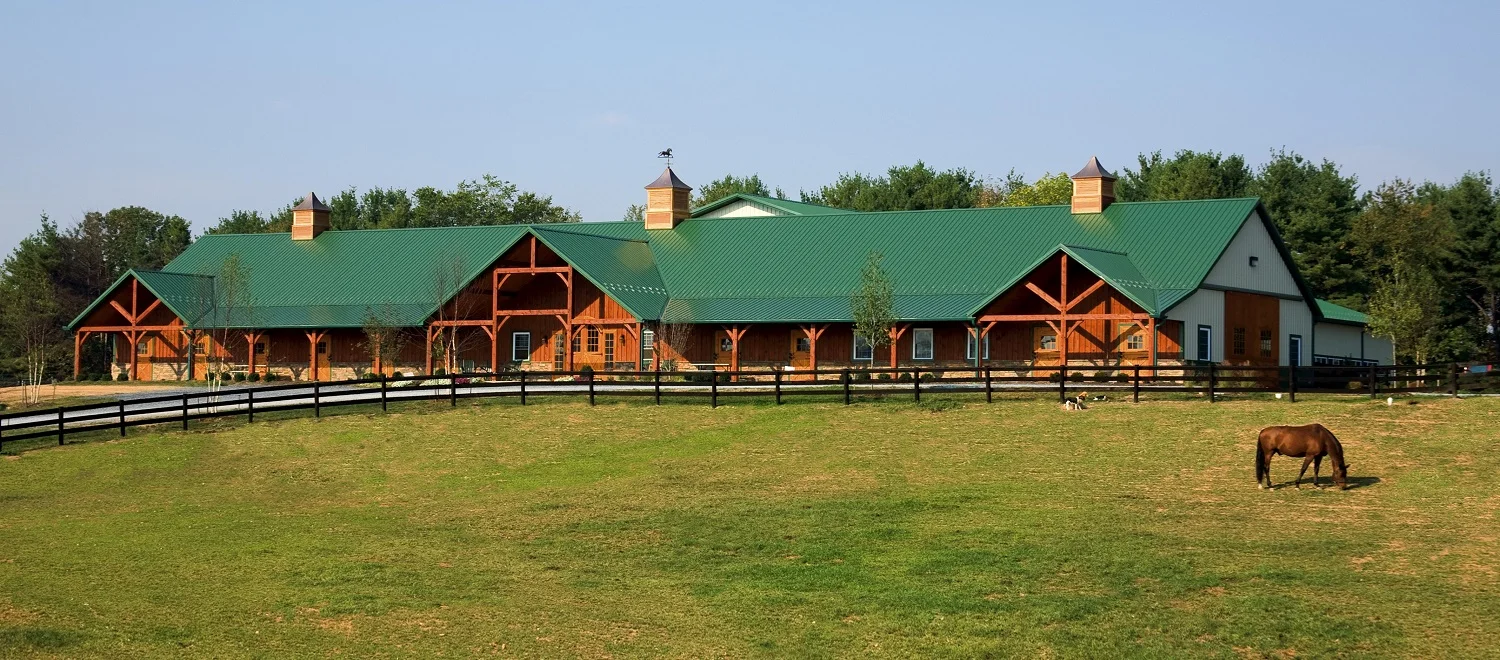Our spacious 18 stall barn was designed for comfort of both horse and owner, and received the Barn Builders' Association "2007 Horse Barn of the Year" award