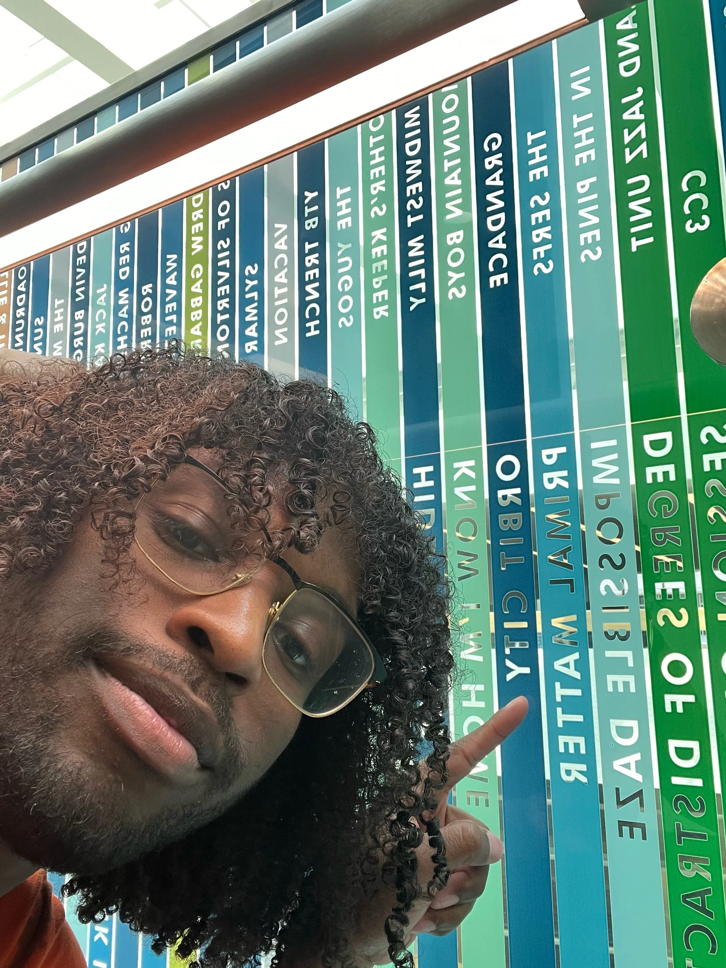 grandace pointing at his spot on the social stairs