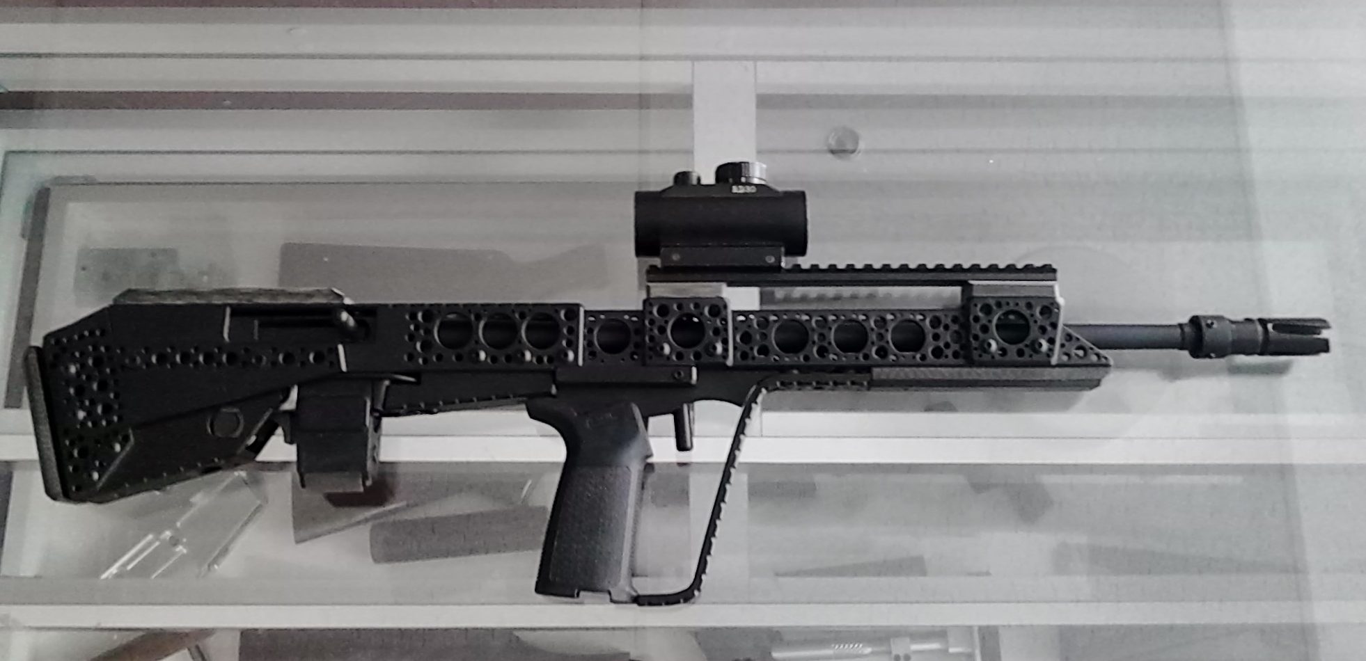 Bull Pup Conversion Ruger 1022 - .22 LR - 18.5" barrel - 10 round mag. on custom aluminum frame painted with Cerakote's "graphite black".