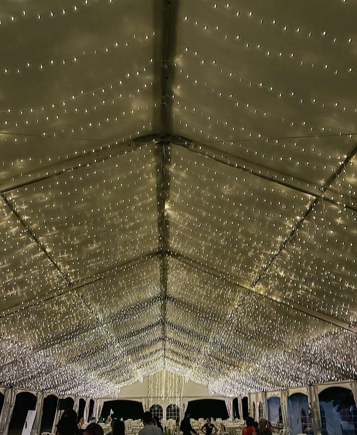 Curtain lights on the ceiling of the dining tent at i4C
