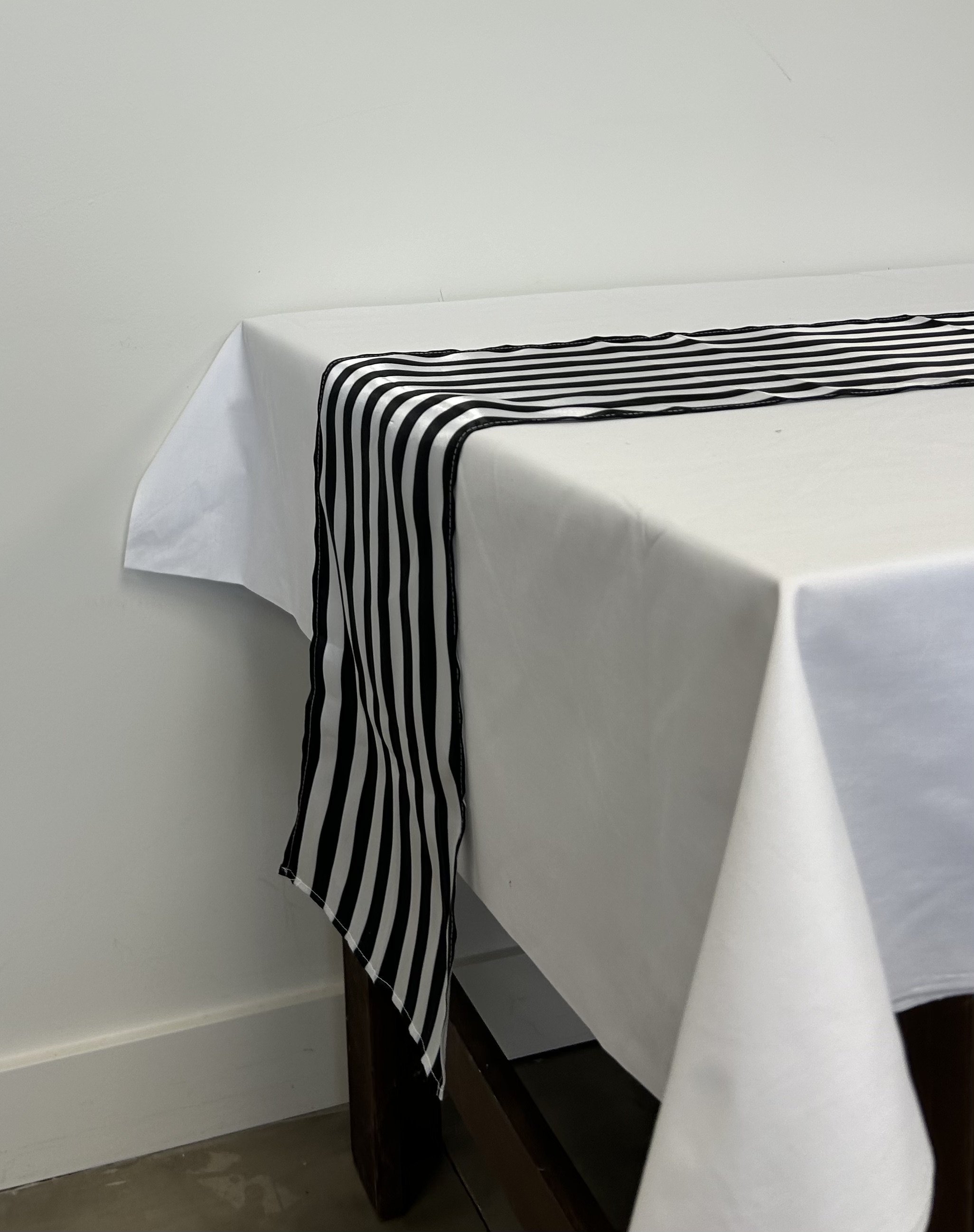 Black and white stripped table runner to add some fun to your tables