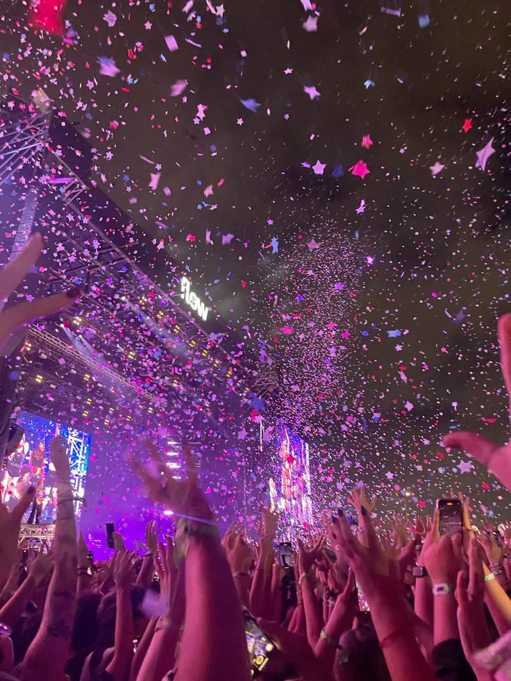 Concert with star shaped confetti in the sky