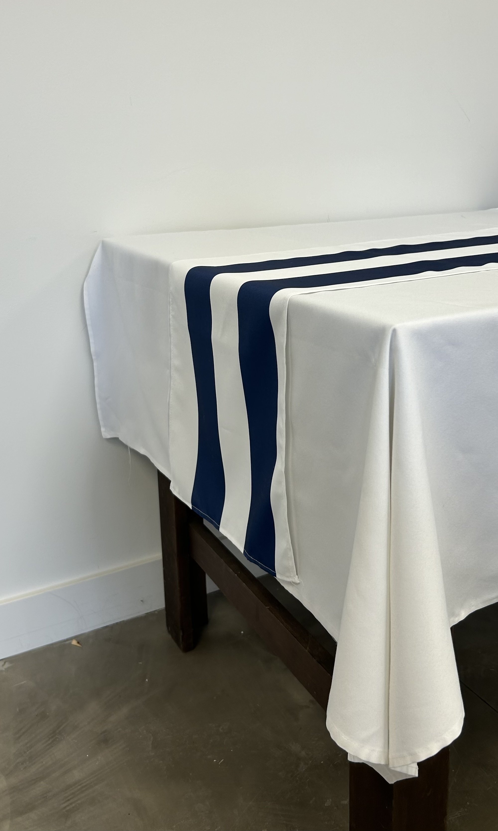 Blue and white stripped table runner can be dressed up or can be kept casual