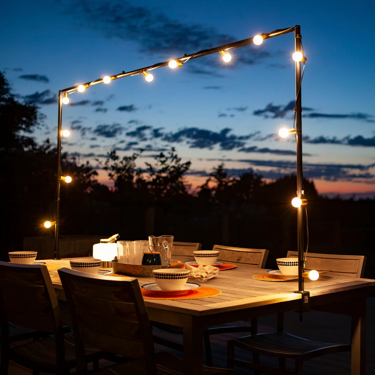 Table set with our adjustable table frame with lights attached to add ambience