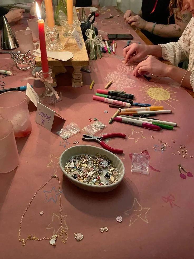 Table with jewelry making tools and beads