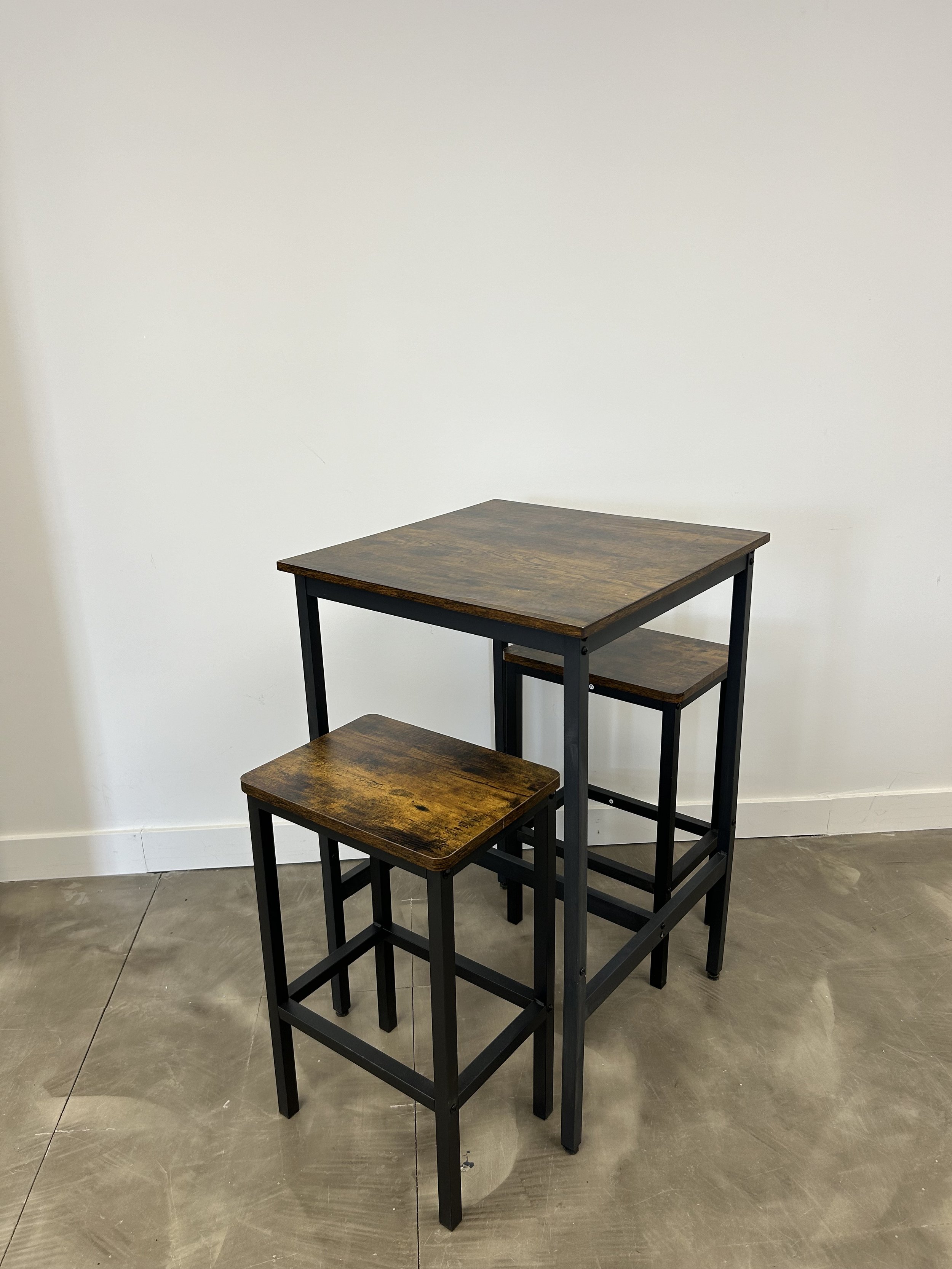 Two seater wood hightop table and stools for cozy seating option