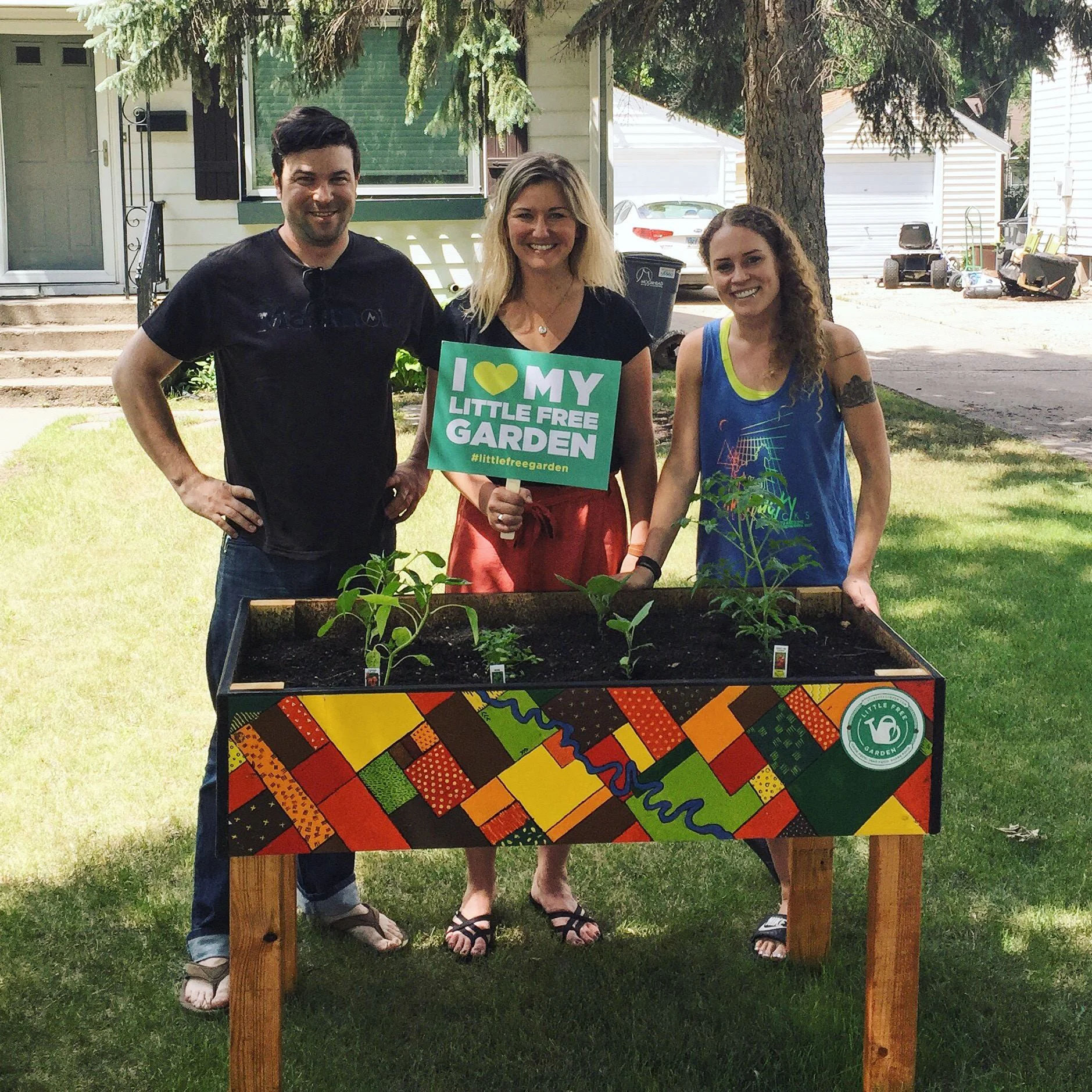 Co-founders, Jeff Knight, Megan Myrdal and Gia Rassier with Little Free Garden no. 4