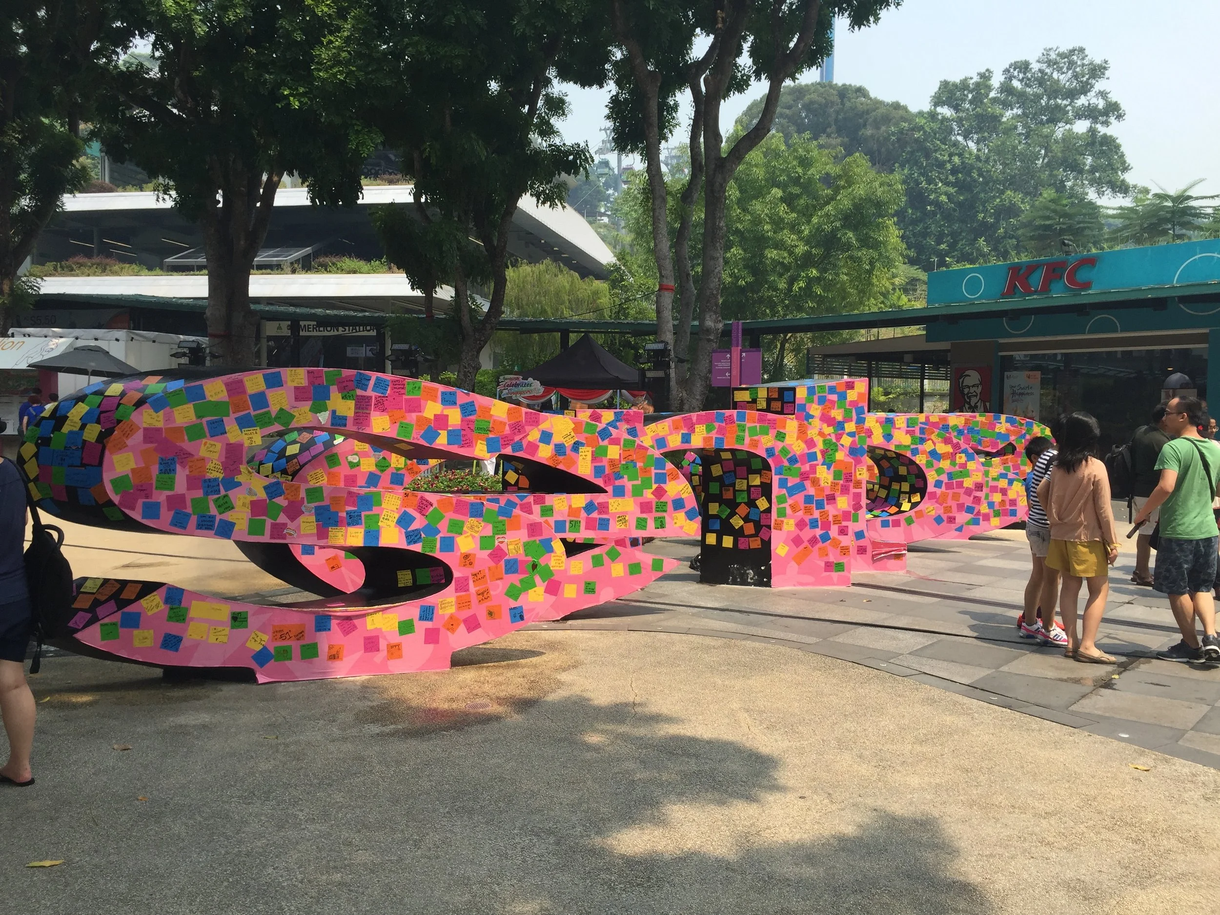 Sentosa logo wall with Stick On messages and stickers