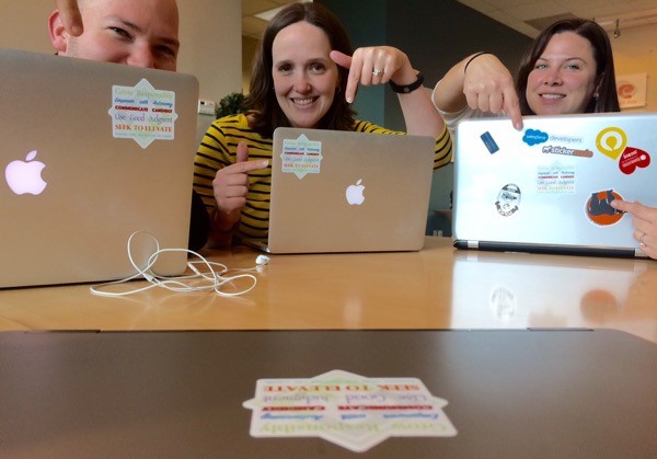 ExactHire’s Team with the Die-Cut Stickers of the Organization’s Values Image via ExactHire Blog