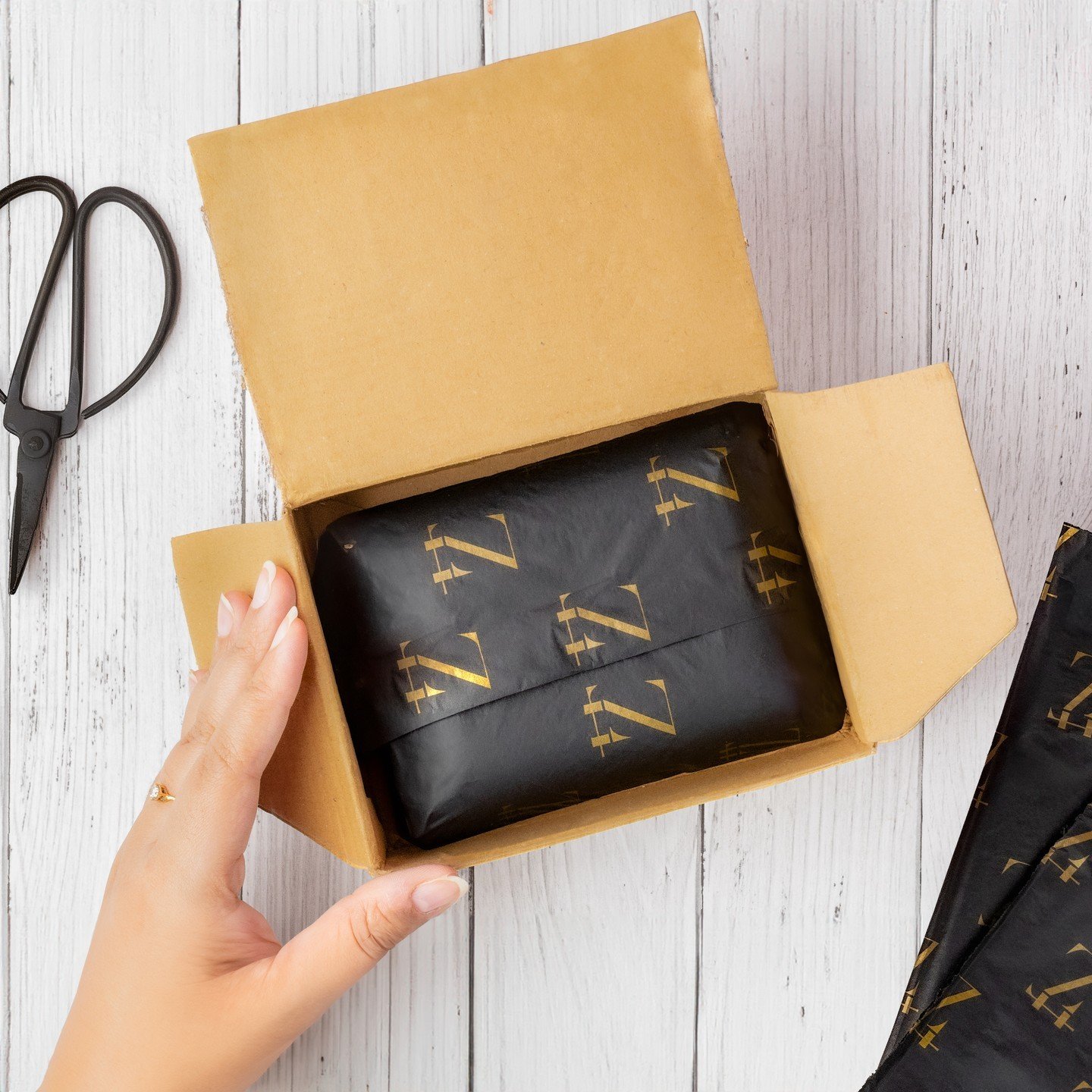 Custom tissue paper packaging: Make a 'wow' unboxing experience! Enhance your brand&rsquo;s  presence with impactful packaging for employee gifts, customer gifts and more. Explore customizable tissue paper packaging options to make every package uniq