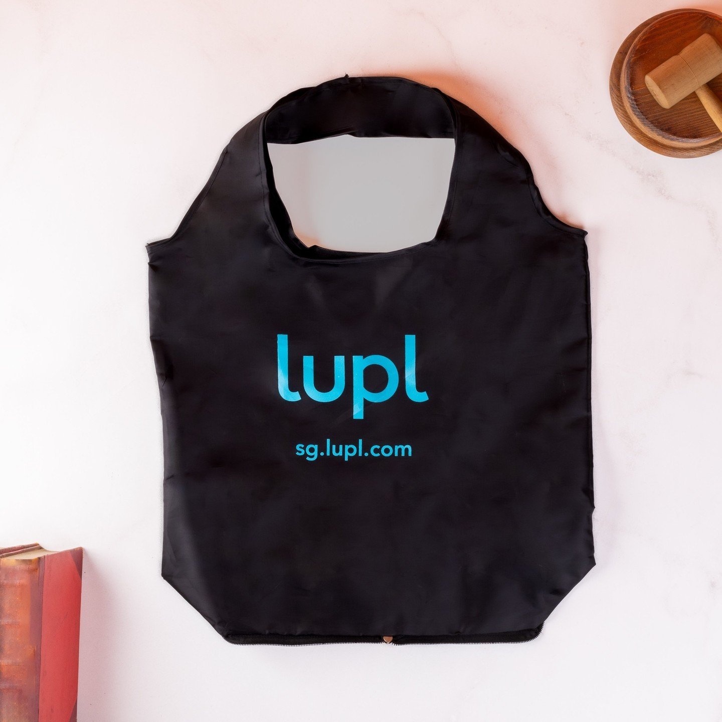 Custom made foldable reusable bag for LUPL - an emblem of corporate charisma! Make waves and flaunt your brands commitment to excellence in style. Ready to ignite your brand's allure?. Get a quote today!

 #CustomFoldableBag #ReusableBags #LUPL #Corp