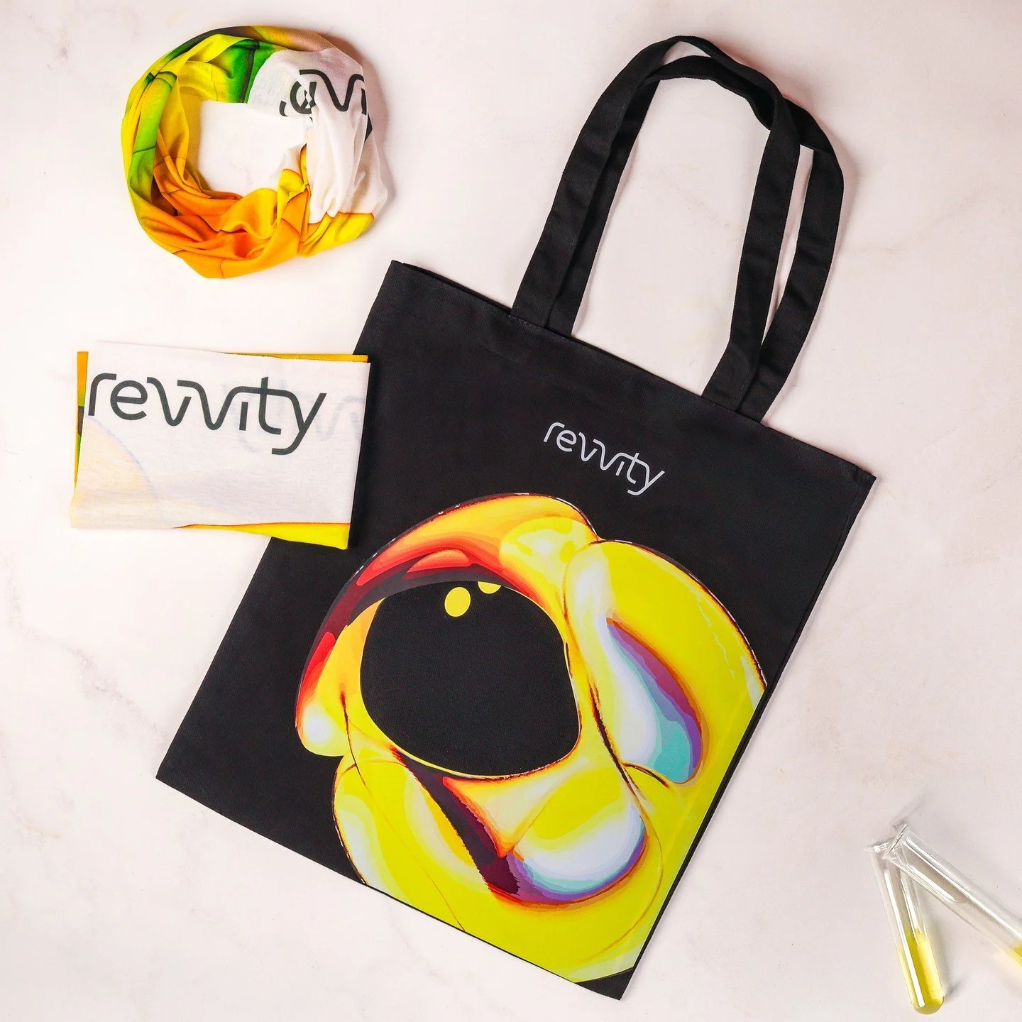 Bold visuals. Smarter branding💡
Revvity proves consistency can look this good
Custom tote and scarf combo that turns every errand into a brand impression. 
Want your brand to travel further than your business card? 
Let’s create merch that mov