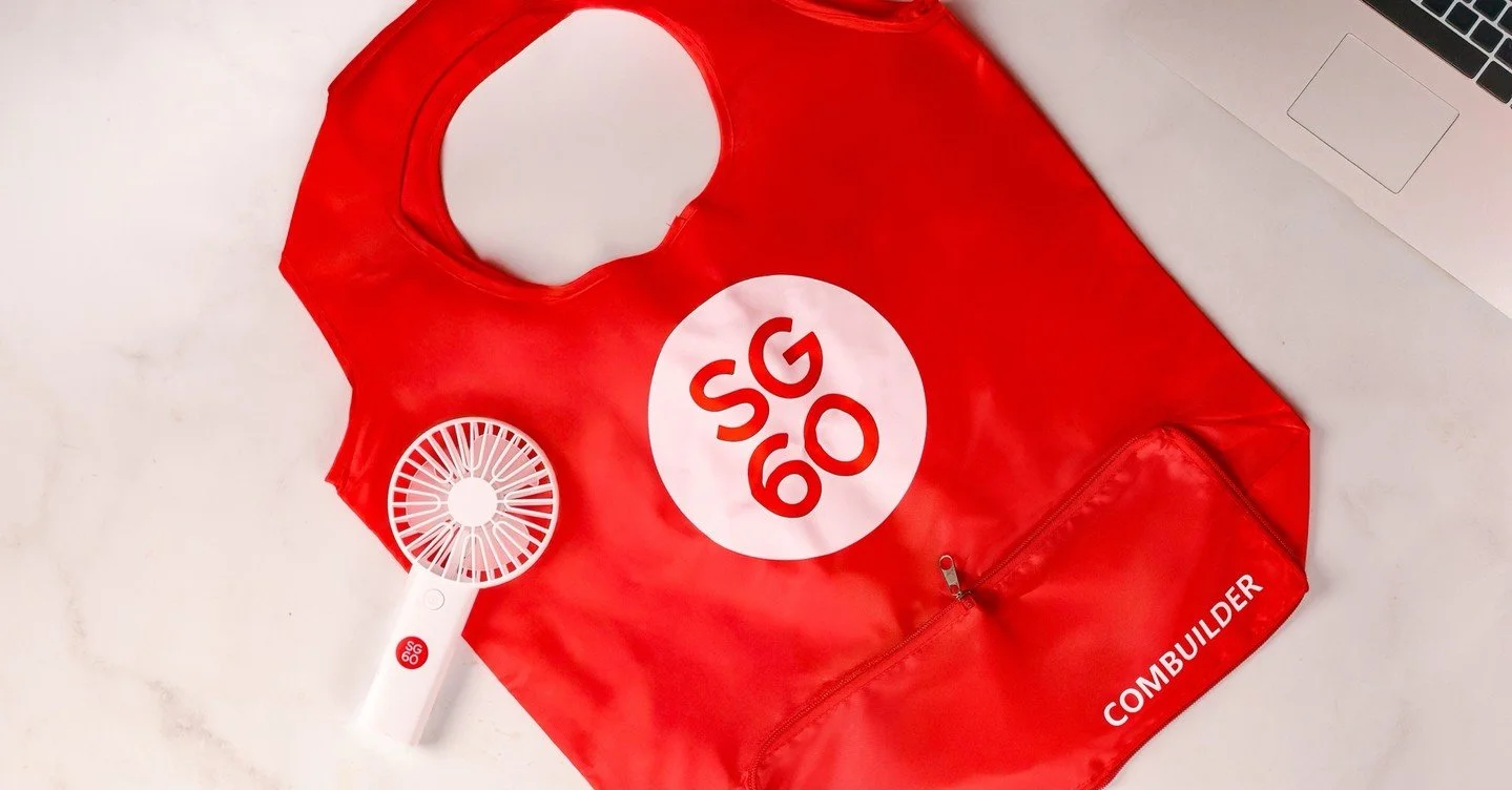 Bright, practical, and instantly recognisable; SG60 nailed the brief.

It delivers visibility, function, and a whole lot of national pride - all in one.

When merch works this hard, people don&rsquo;t just keep it they use it.

#b2bmarketing #branded