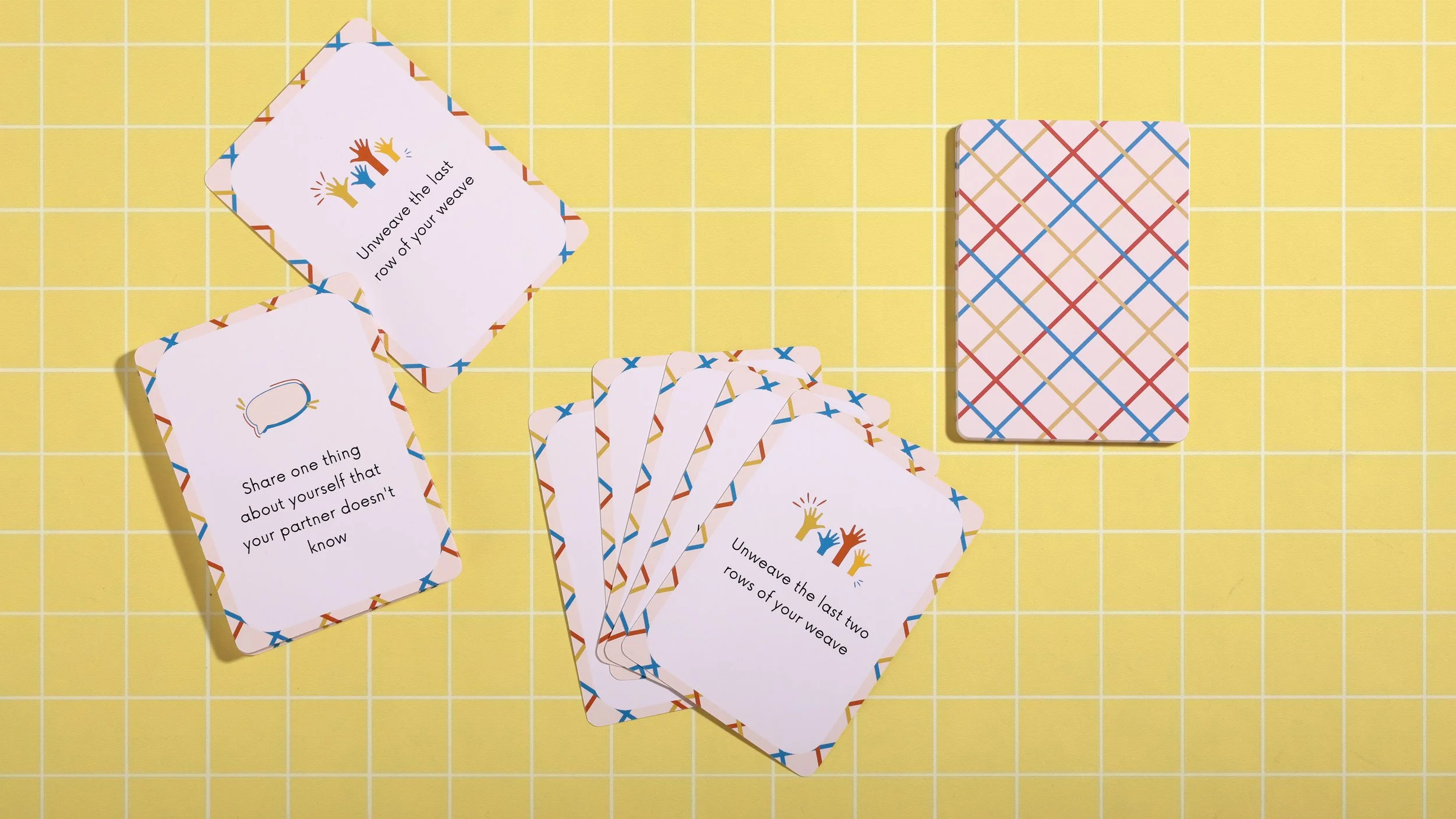 Custom printed conversation card game with woven pattern back design, showing prompt cards for relationship and icebreaker games