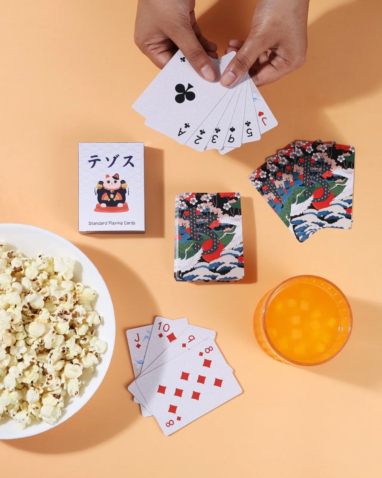 Two custom Japanese-inspired Tezos branded playing card designs used as blind box conference merch