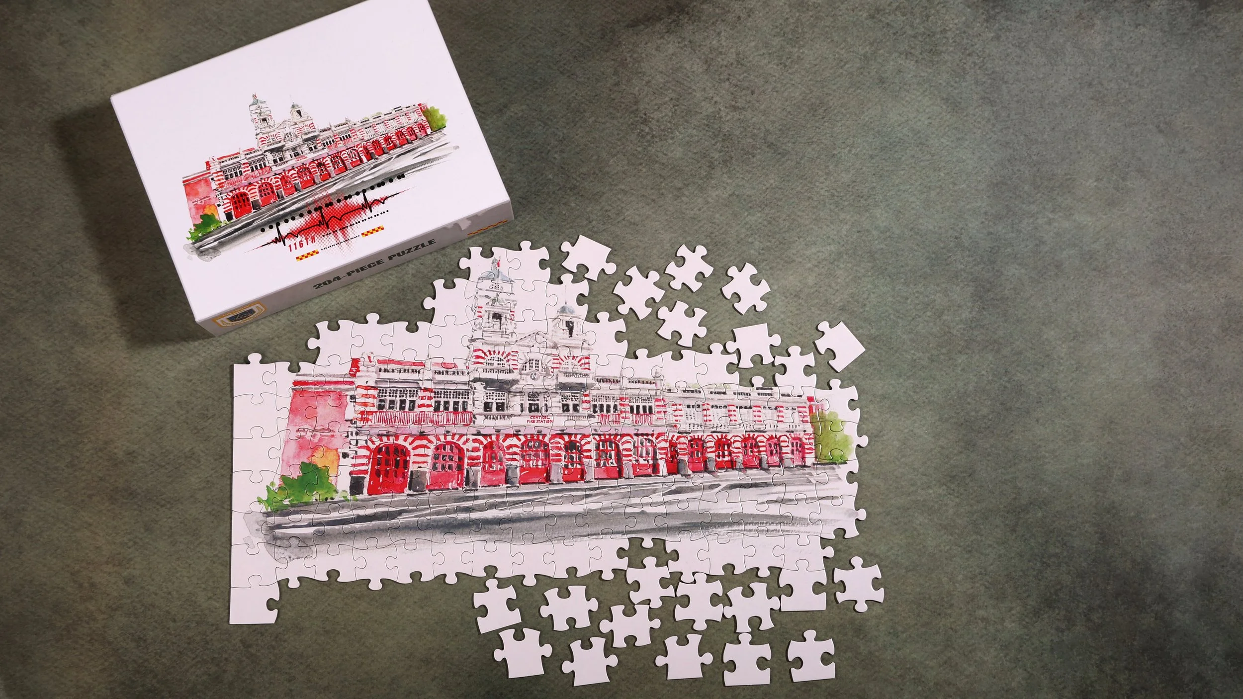 Custom jigsaw puzzle with watercolour illustration of Central Fire Station, 204-piece corporate anniversary gift printed in Singapor