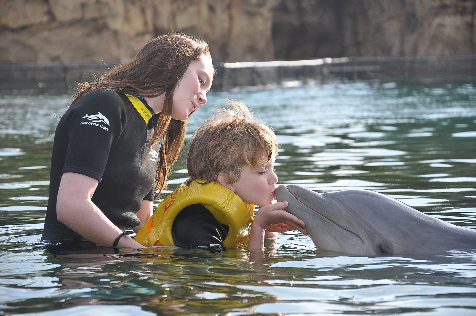 kissing a dolphin is so much sweeter when you're missing school photo by Discovery Cove staff photographer