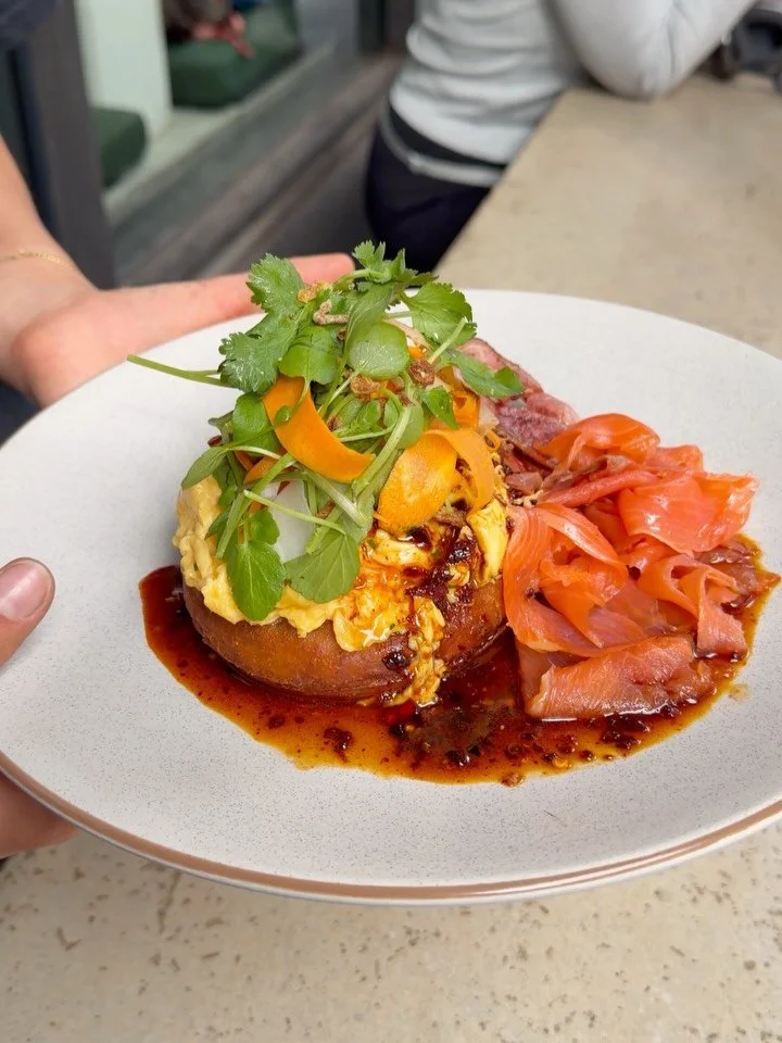 Protein maxxing. Shallot pancake with garlic-chive scram, smoked trout, bacon, avocado and black vinegar-chilli dressing. Hot stuff 🔥