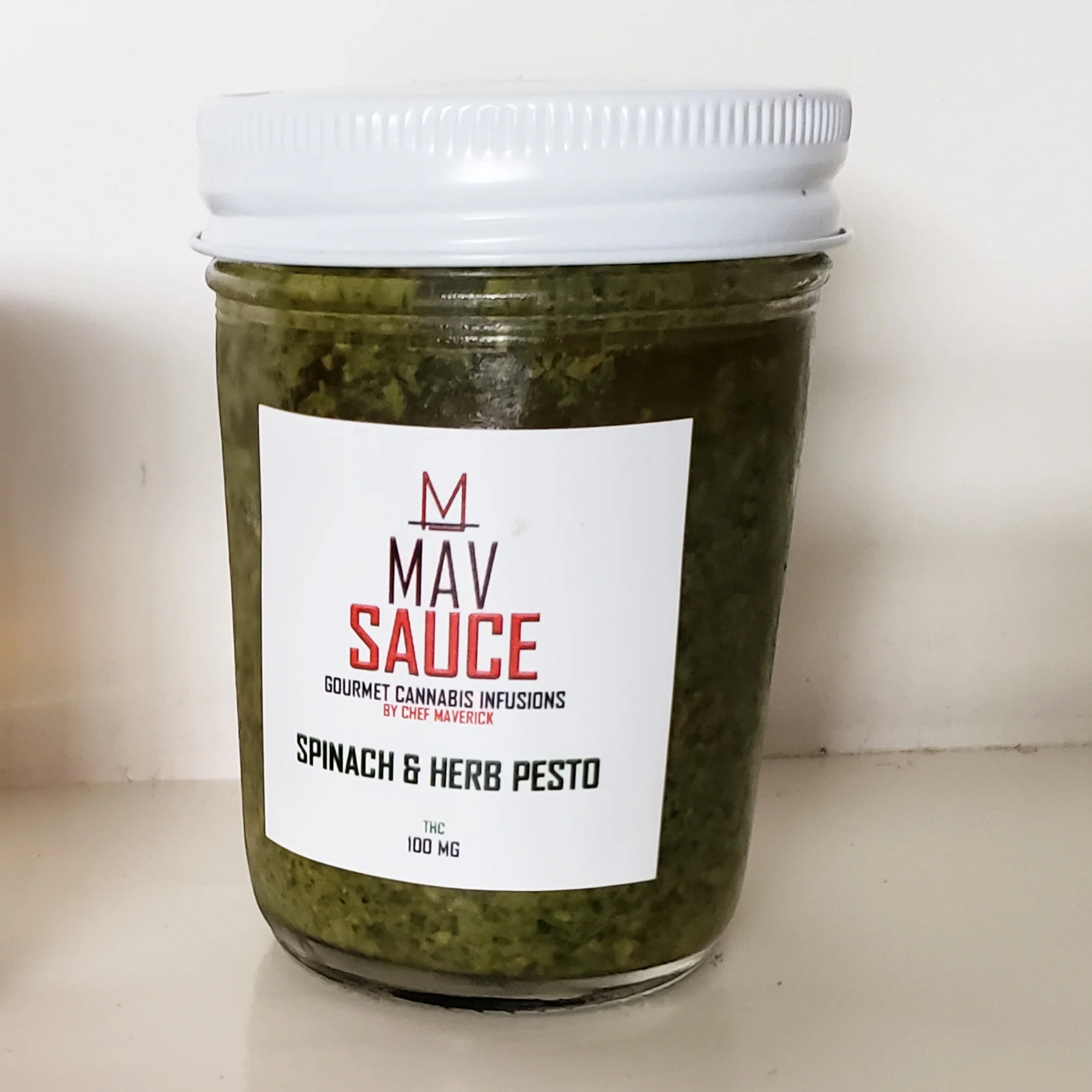 SPINACH & HERB PESTO CHEF MAVERICK'S SPECIAL RECIPE INFUSED PESTO COMES PACKED WITH TONS OF FLAVOR. MADE WITH SPINACH, BASIL, PARSLEY, GARLIC, OLIVE OIL, PARMESAN CHEESE ALONG WITH A SPECIAL BLEND OF SPICES AND SEASONINGS. AVAILABLE DOSES: 8 OZ - 100 MG GLUTEN FREE, SOY FREE
