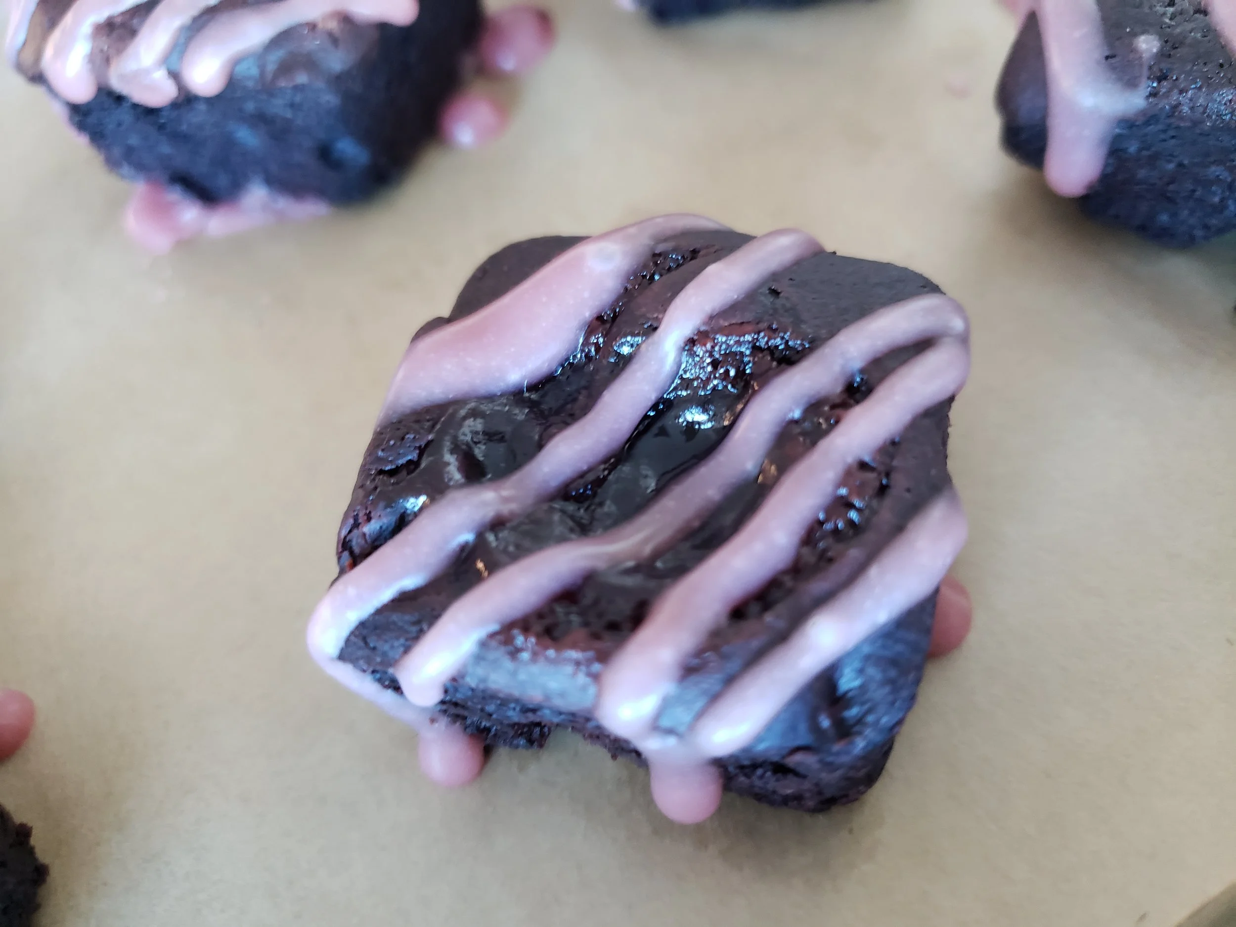 FEATURED ITEM |GOODNIGHT BITE (CURRENTLY AVAILABLE) INFUSED HANDMADE MOIST VEGAN DOUBLE CHOCOLATE BROWNIE BITE WITH RASPBERRY JAM BAKED ON TOP DRIZZLED WITH RASPBERRY CREAM CHEESE ICING. AVAILABLE DOSES: 25 MG THC GLUTEN FREE, SOY FREE, VEGAN *LIMITED QUANTITIES AVAILABLE*