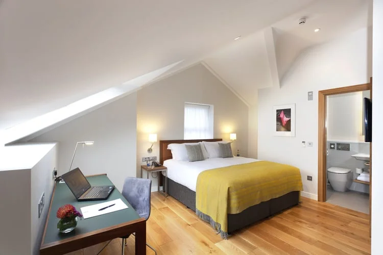 bedroom+&+work+desk+in+loft+style+suite.jpg
