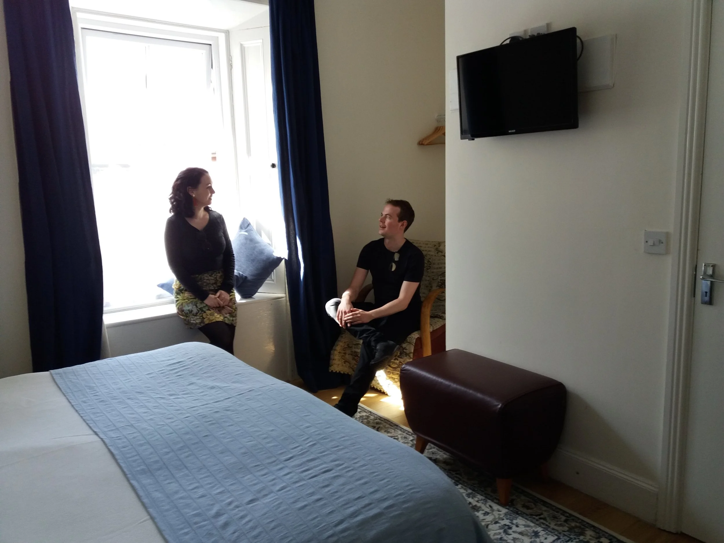 Couple chatting in room.jpg