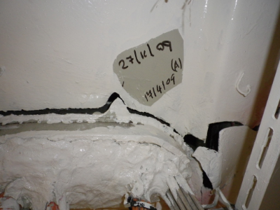 Crack in a class A0 bulkhead separating the fire locker from an accommodation corridor on a passenger vessel - tolerated by the flag State