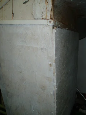 Some seem to want to reverse the clock and at least go back to the wooden ships...; shown is the plywood repair of an engine room ventilation duct on a cargo vessel