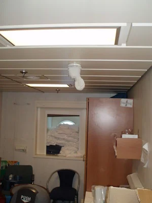 Smoke on the water - particularly when the ship burns down;&nbsp;"socked-up" smoke detector in crew meeting cabin on a passenger ship
