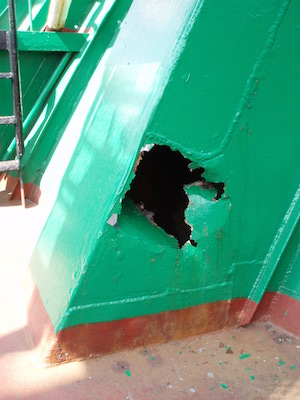 "Cardboard is out and so are cardboard derivatives..."; this is a taped hole in a cargo hold ventilation duct on the main deck