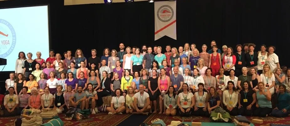 The smiling faces of the IYASE Members who attended the 2016 IYNAUS CONVENTION with Abhijata Sridhar. Abhijata is a senior teacher at Ramanani Iyengar Memorial Yoga Institute (RIMYI) in Pune, India. Over the Memorial Weekend, she effectively and creatively shared the wisdom she gained from her studies with her maternal grandfather, the world renowned yogacharya, BKS Iyengar, her aunt, Geeta S. Iyengar, and her uncle, Prashant Iyengar.