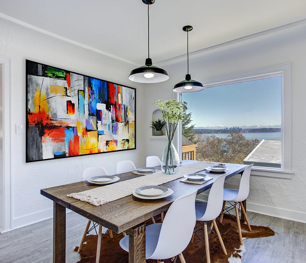 Dining room with white walls and wooden table.