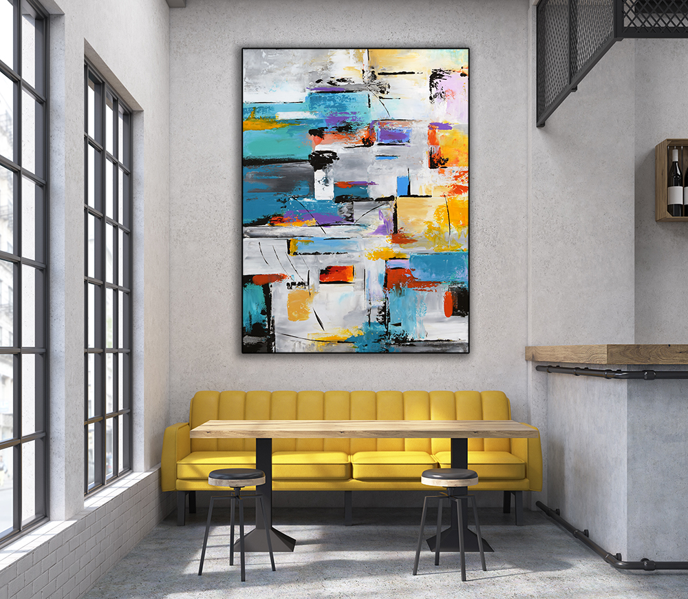 Close up of a cafe with a yellow sofa