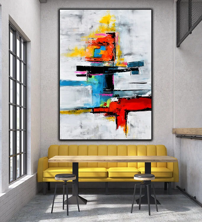 Close up of a cafe with a yellow sofa